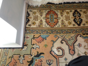 cut corner of persian rug